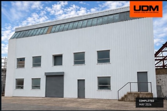 Completed white-clad industrial building for a food production company at Pinnacles Industrial Estate, Harlow, refurbished by UDM