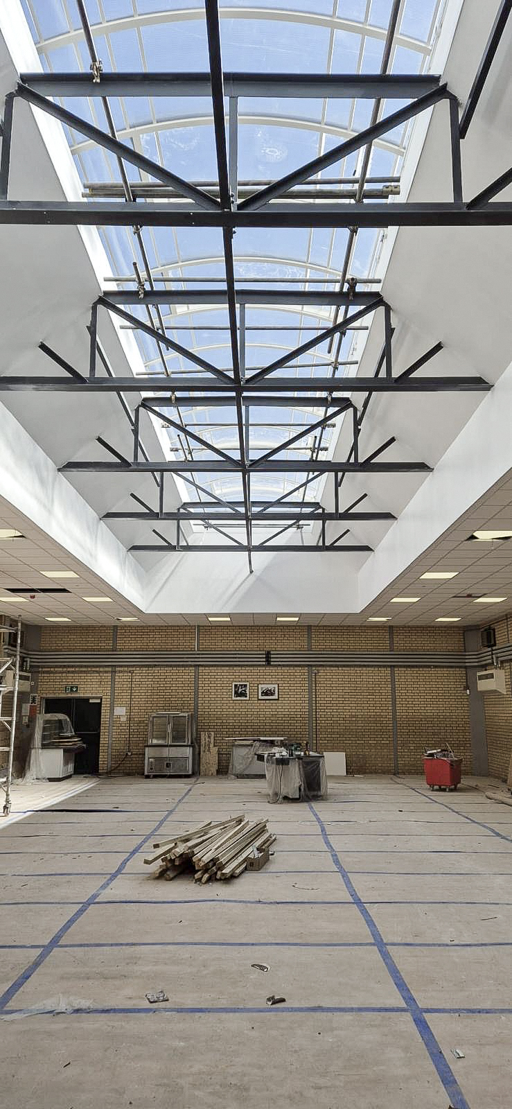Internal view of refurbished rooflights and steel support framing