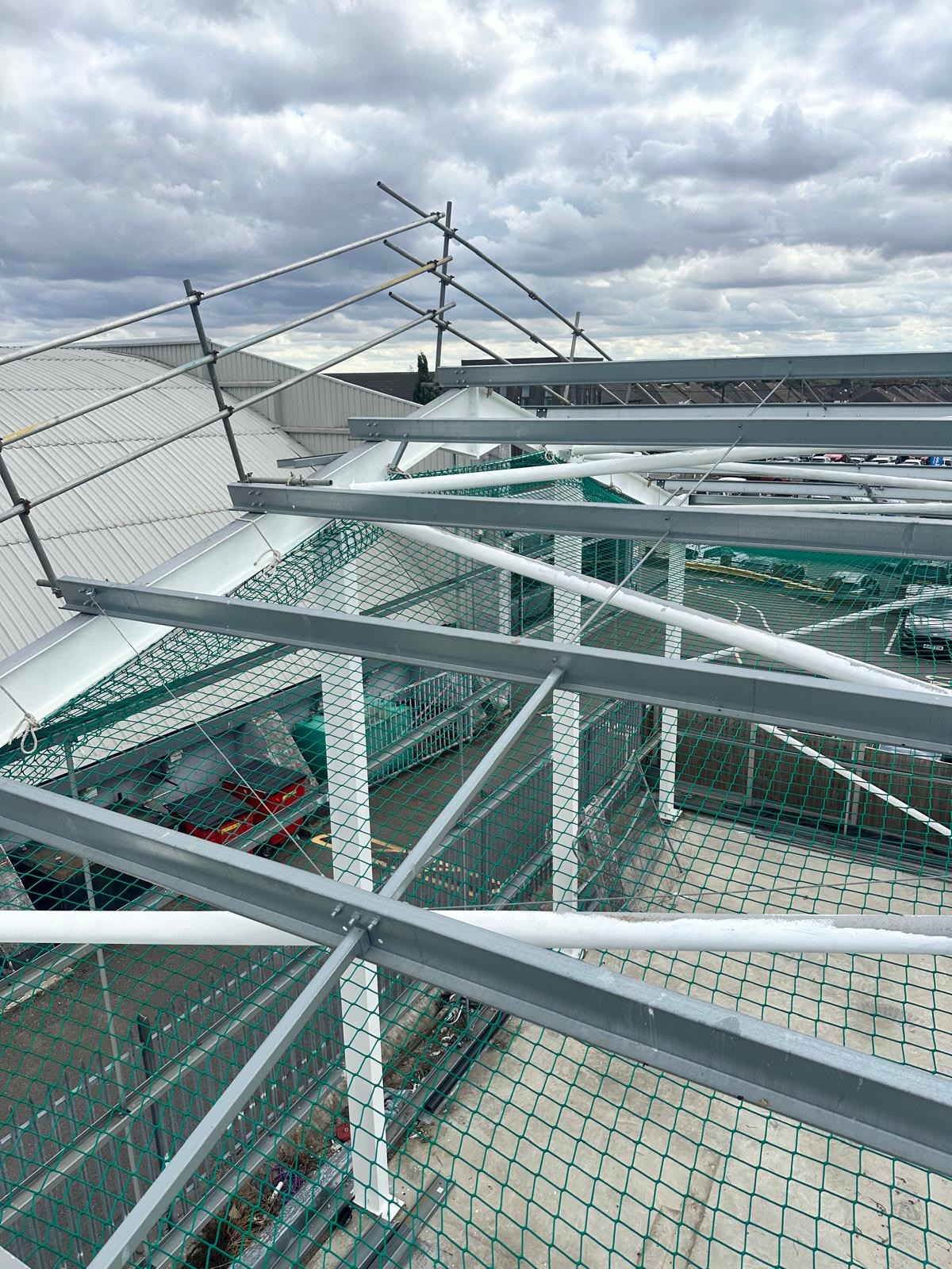 Steel purlins and roof plane of the Springwood Court building during erection