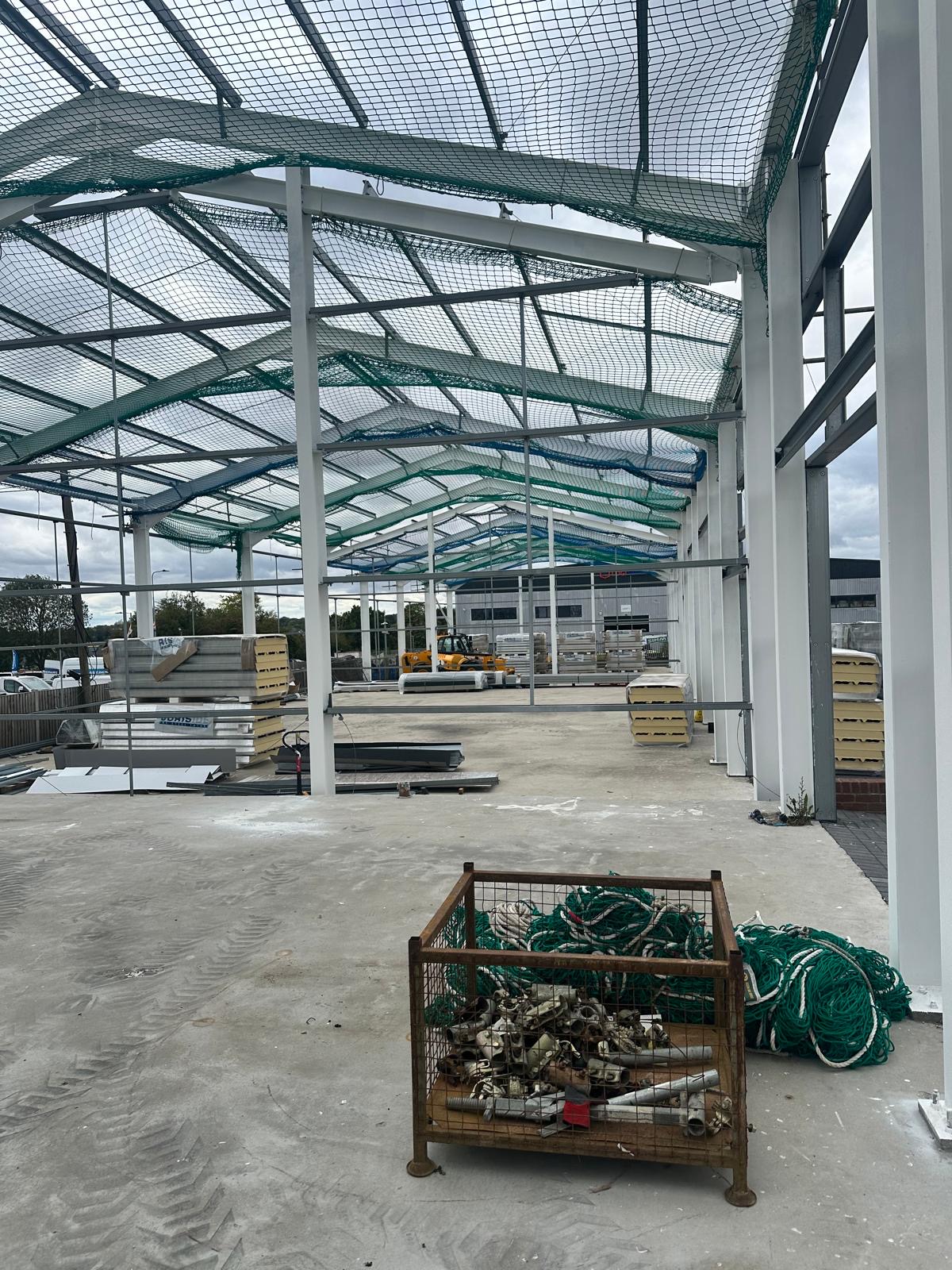 Cladding materials staged inside the Springwood Court steel frame in Braintree